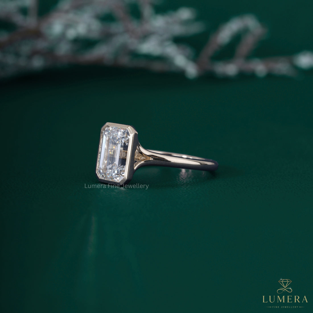 Emerald solitaire setting ring with emerald cut diamond ring.