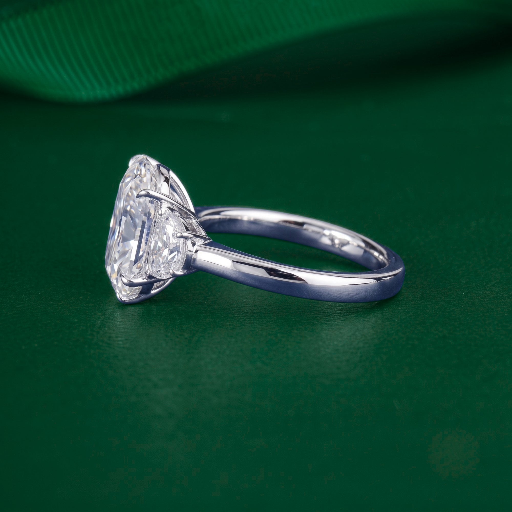 cushion engagement ring on solid gold ring.
