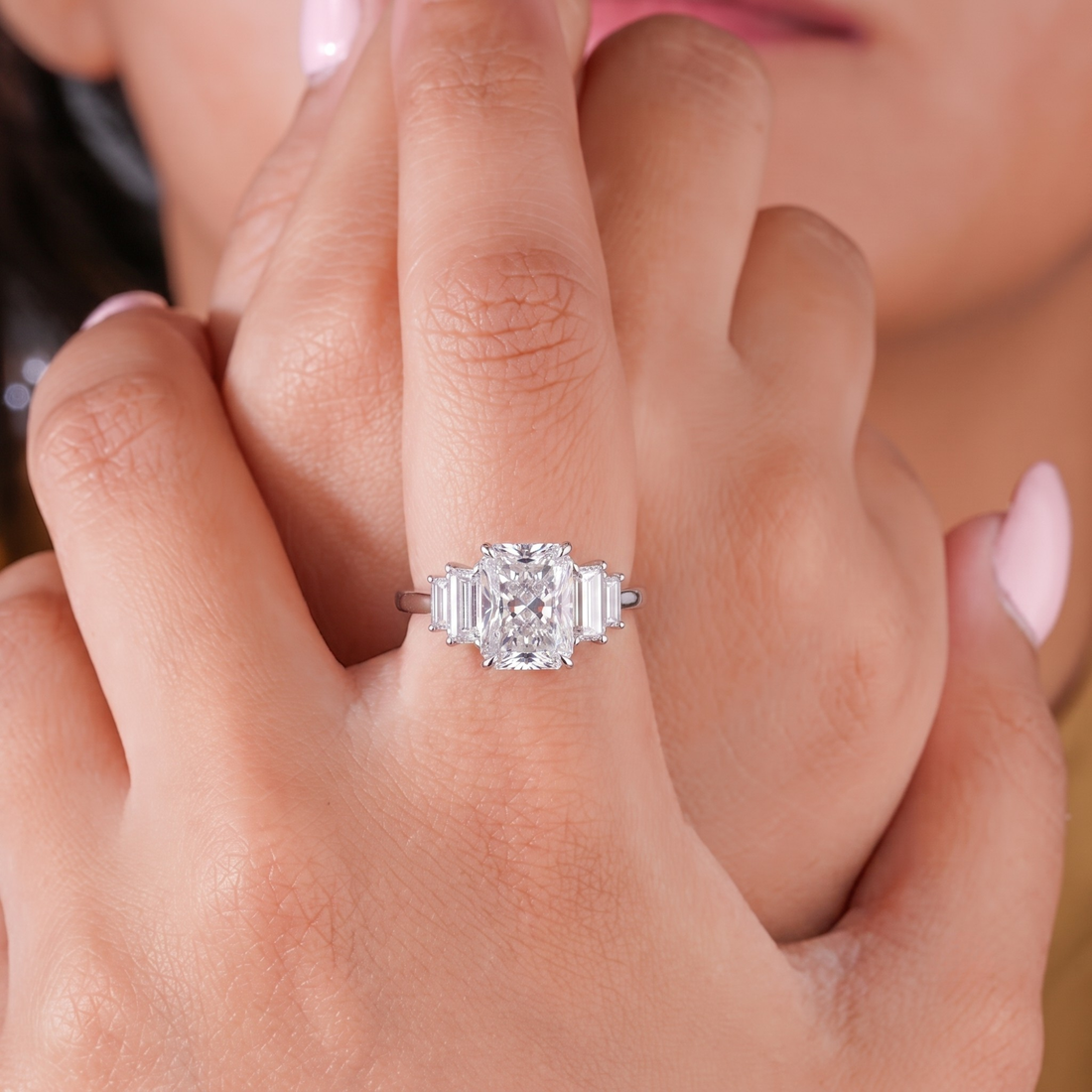claw prong engagement ring with claw prong setting.

