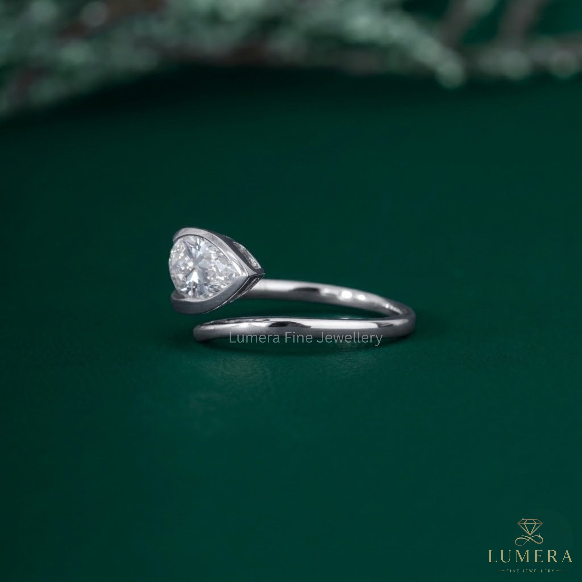 Pear shaped engagement ring with Almond engagement ring.