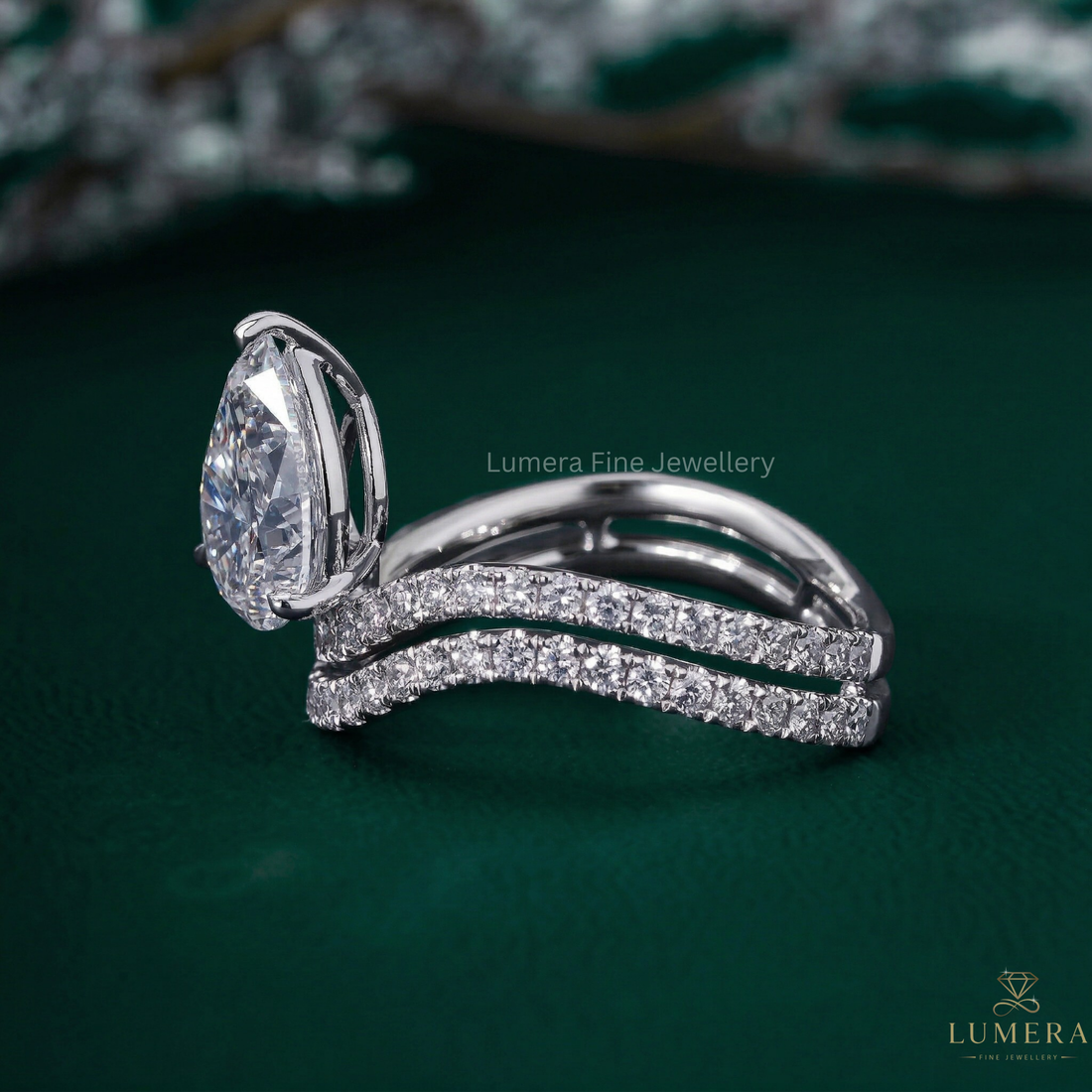 Pear shaped engagement ring with Pear pave engagement ring.