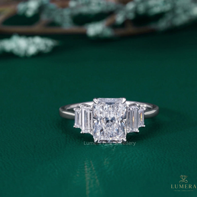 5 stone diamond ring with baguette shape side stone.