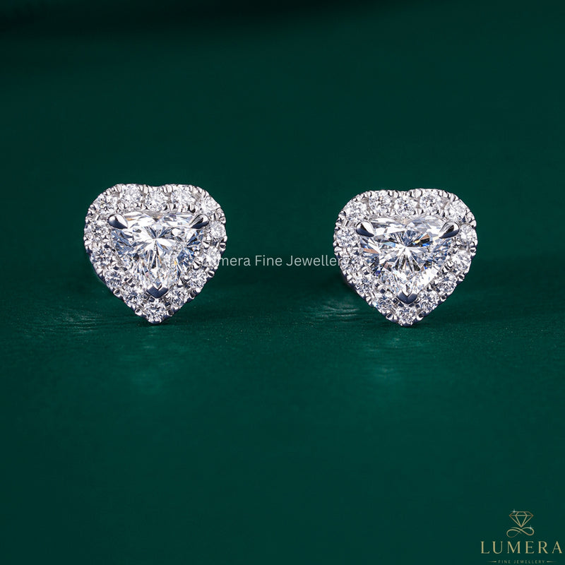 unique engagement ring with solid gold earrings.
