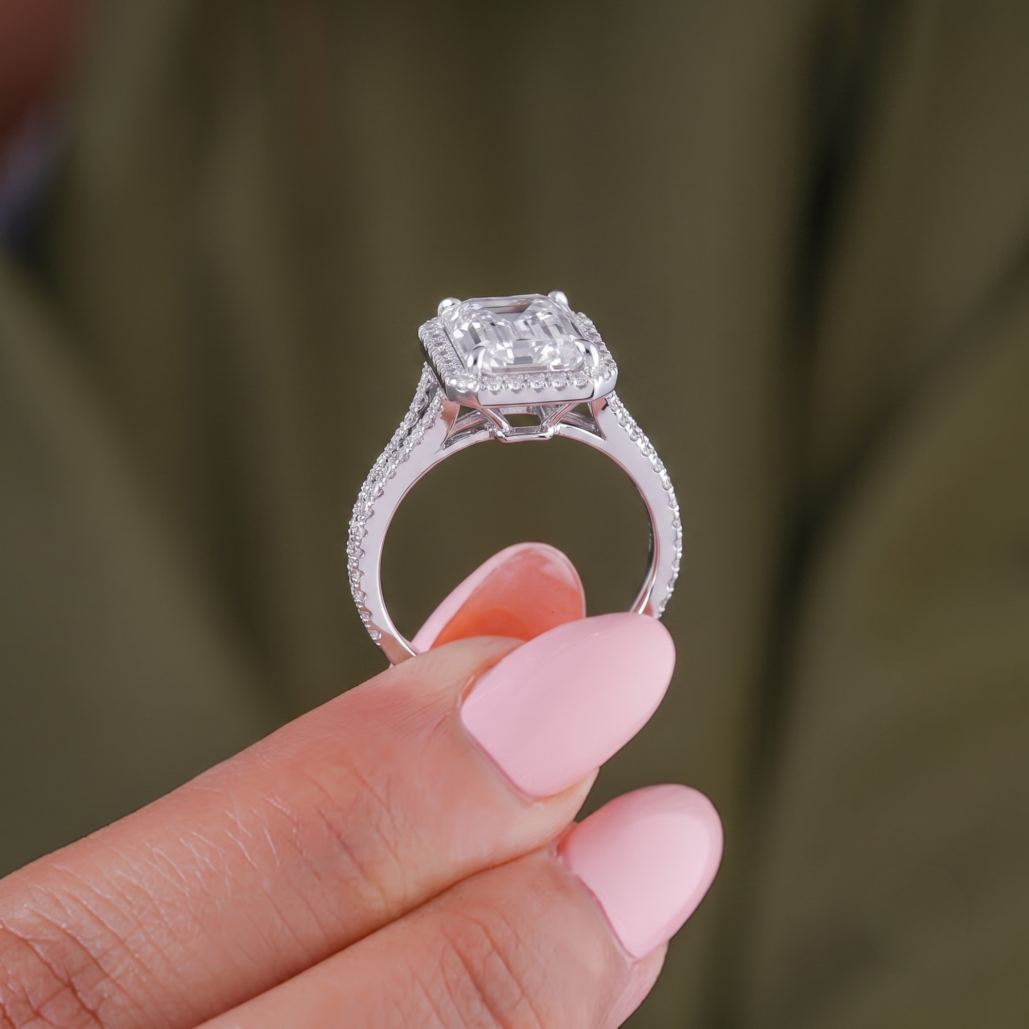 pave engagement ring with 4 claw prong setting.
