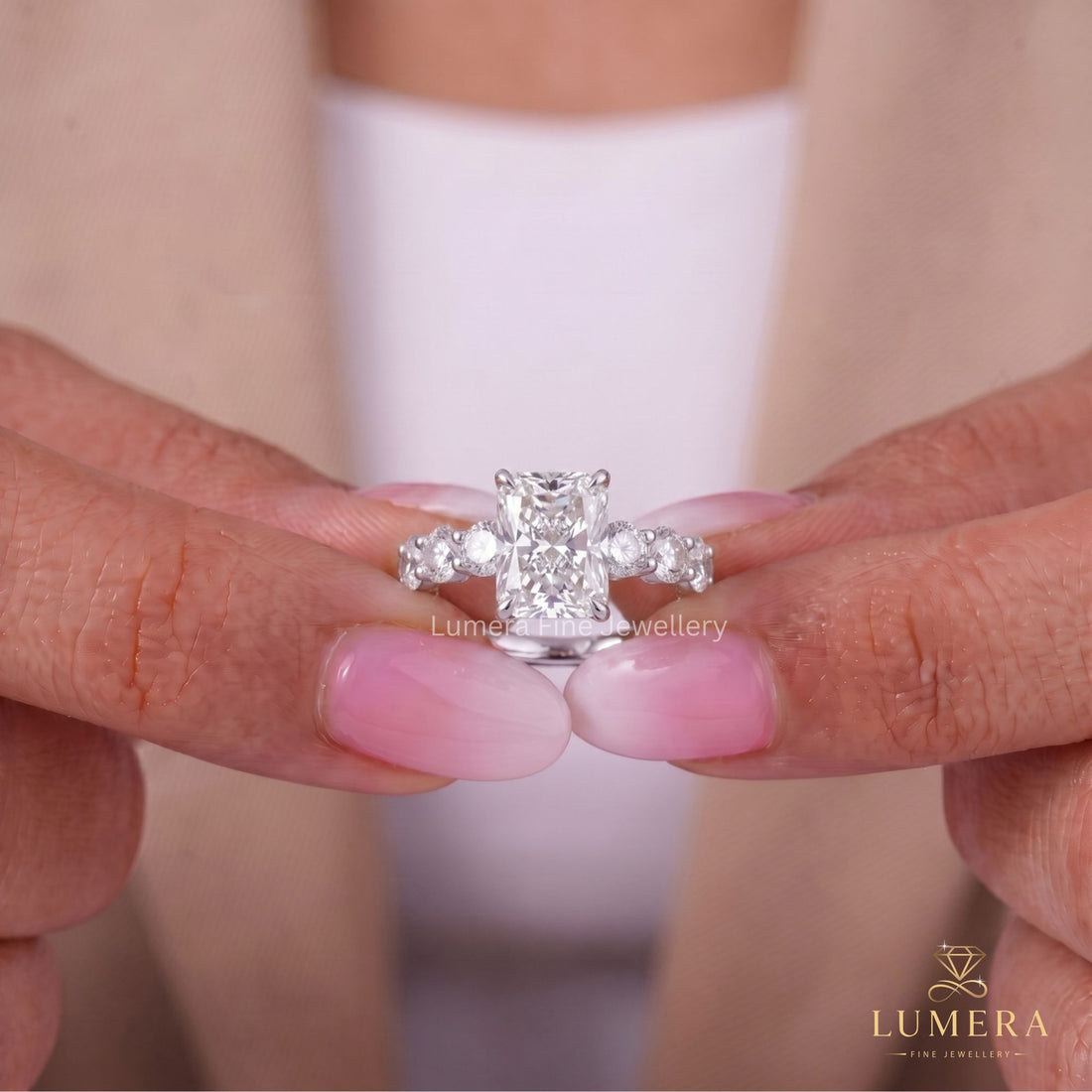 Radiant cut diamond engagement ring with solid gold ring.
