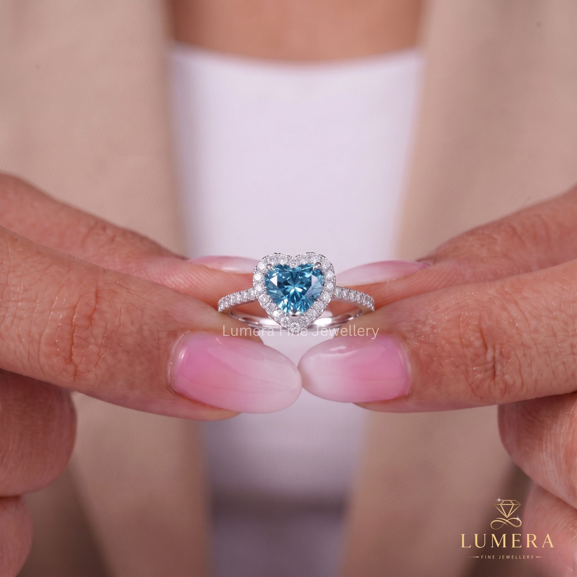 Lumera diamond ring with heart diamond engagement ring.
