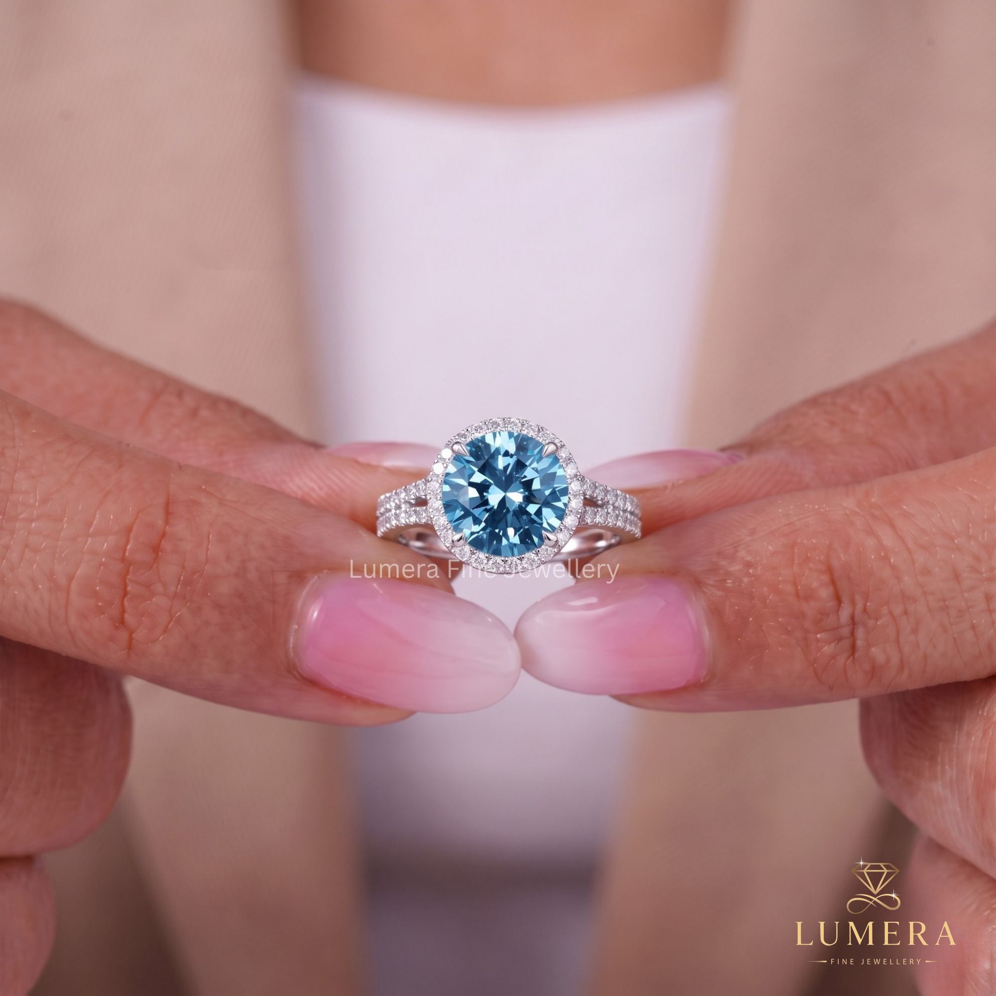 Cathedral setting ring with round cut engagement ring.
