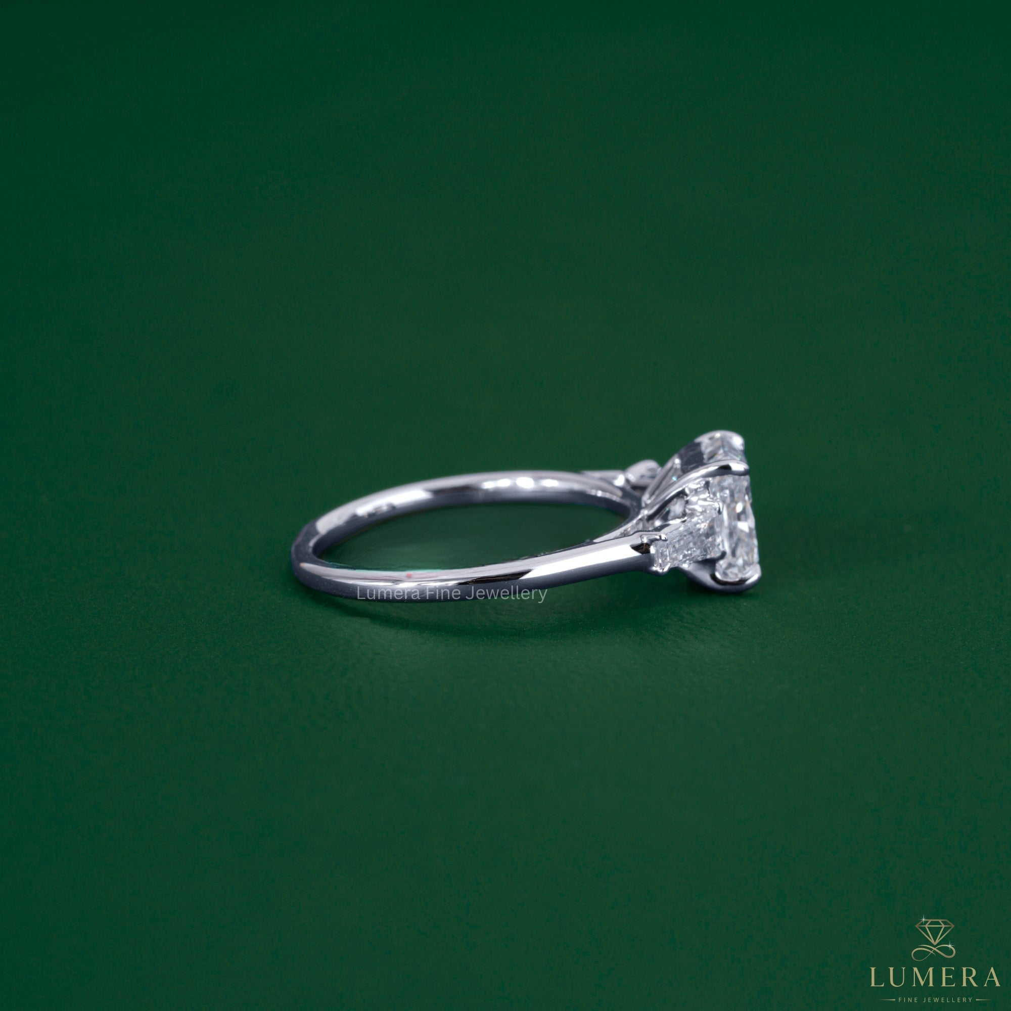 Three stone diamond ring crafted in solid gold ring.