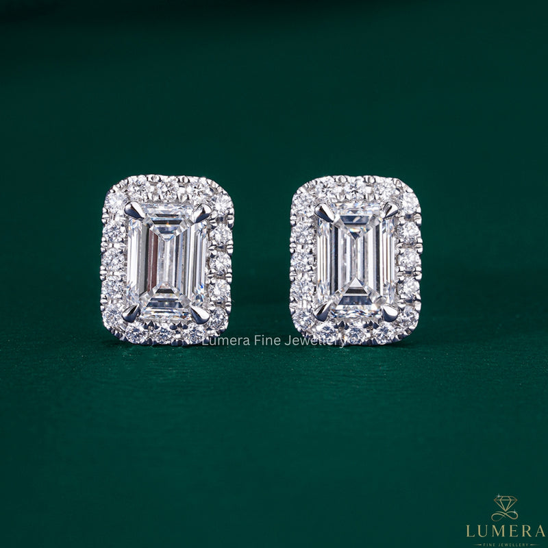 emerald cut stud earrings with halo diamond earrings.

