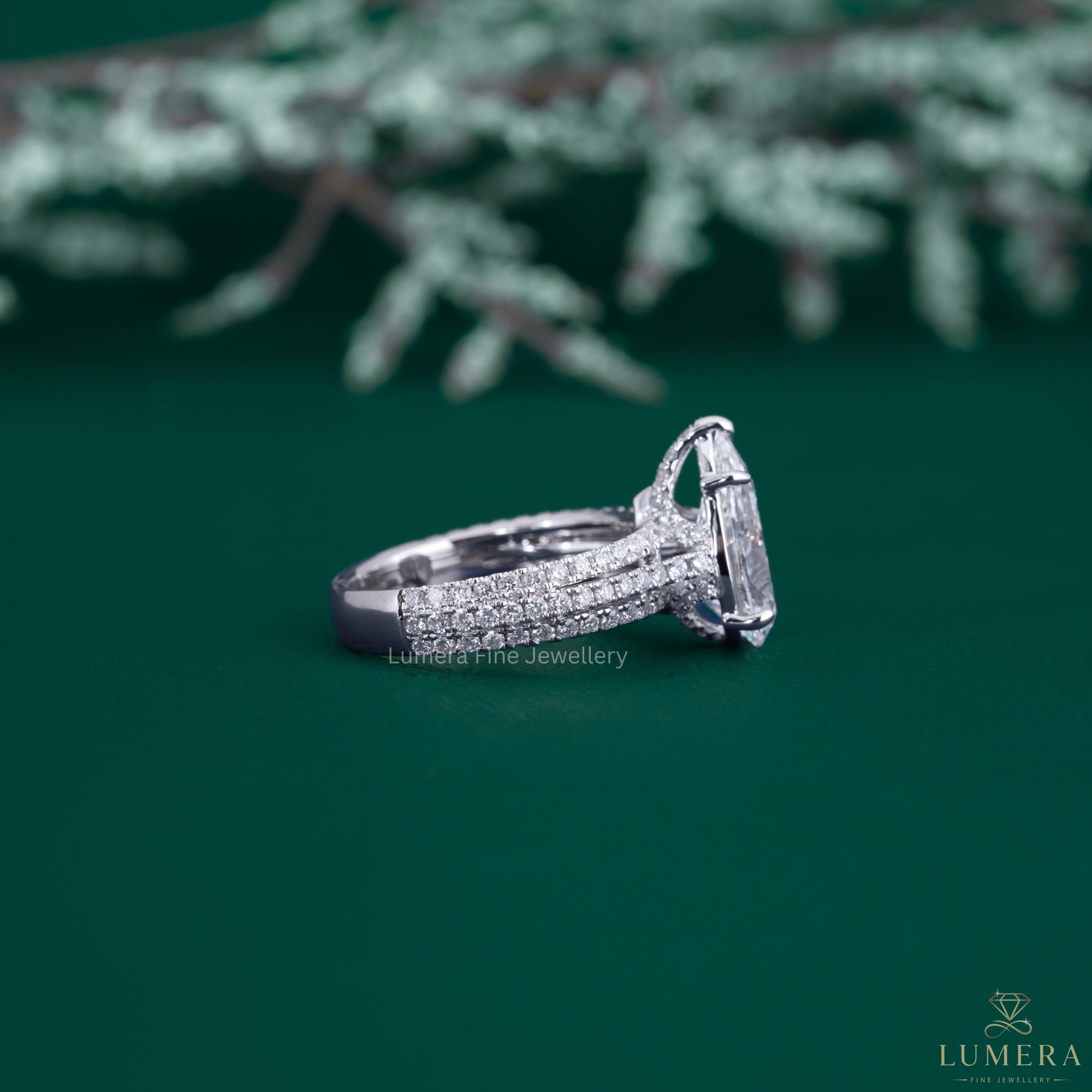 Pave diamond ring with almond engagement ring.