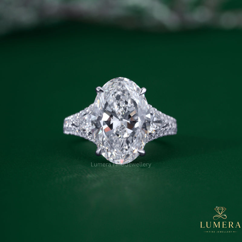 Three Stone Oval Engagement Ring With Pear Side Stone