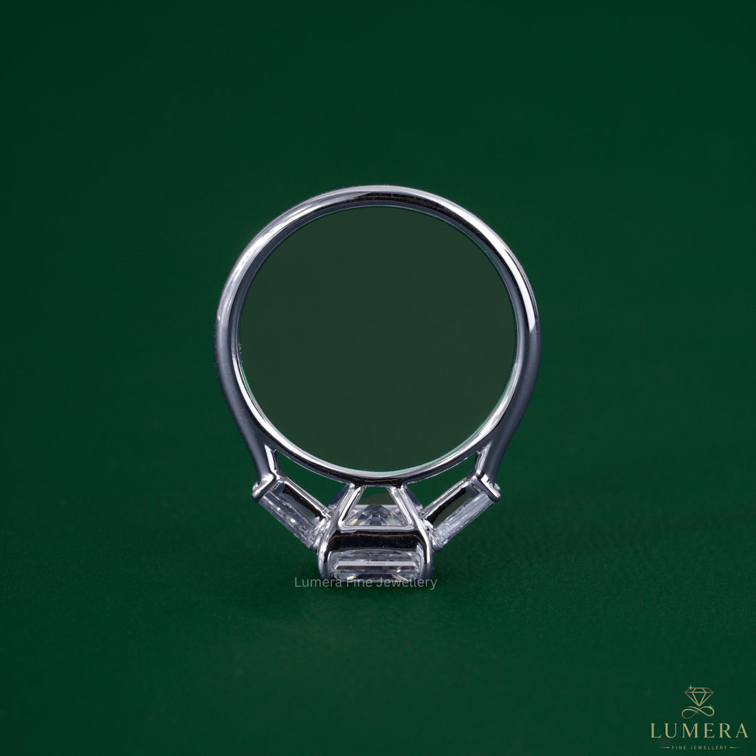 Tapered baguette diamonds paired with a three stone diamond ring.