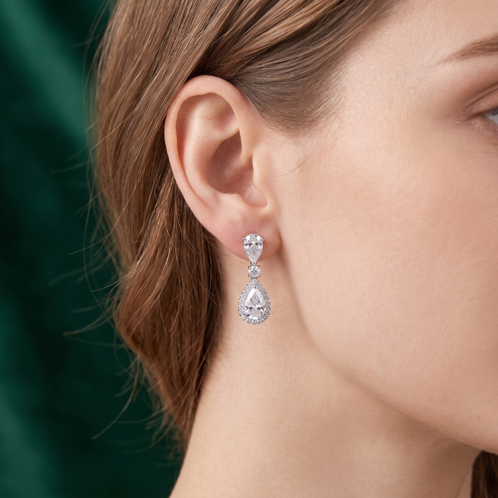 tear drop earrings with drop dangle earrings.
