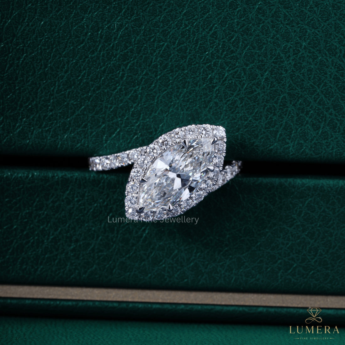 Halo marquise ring with bypass ring.