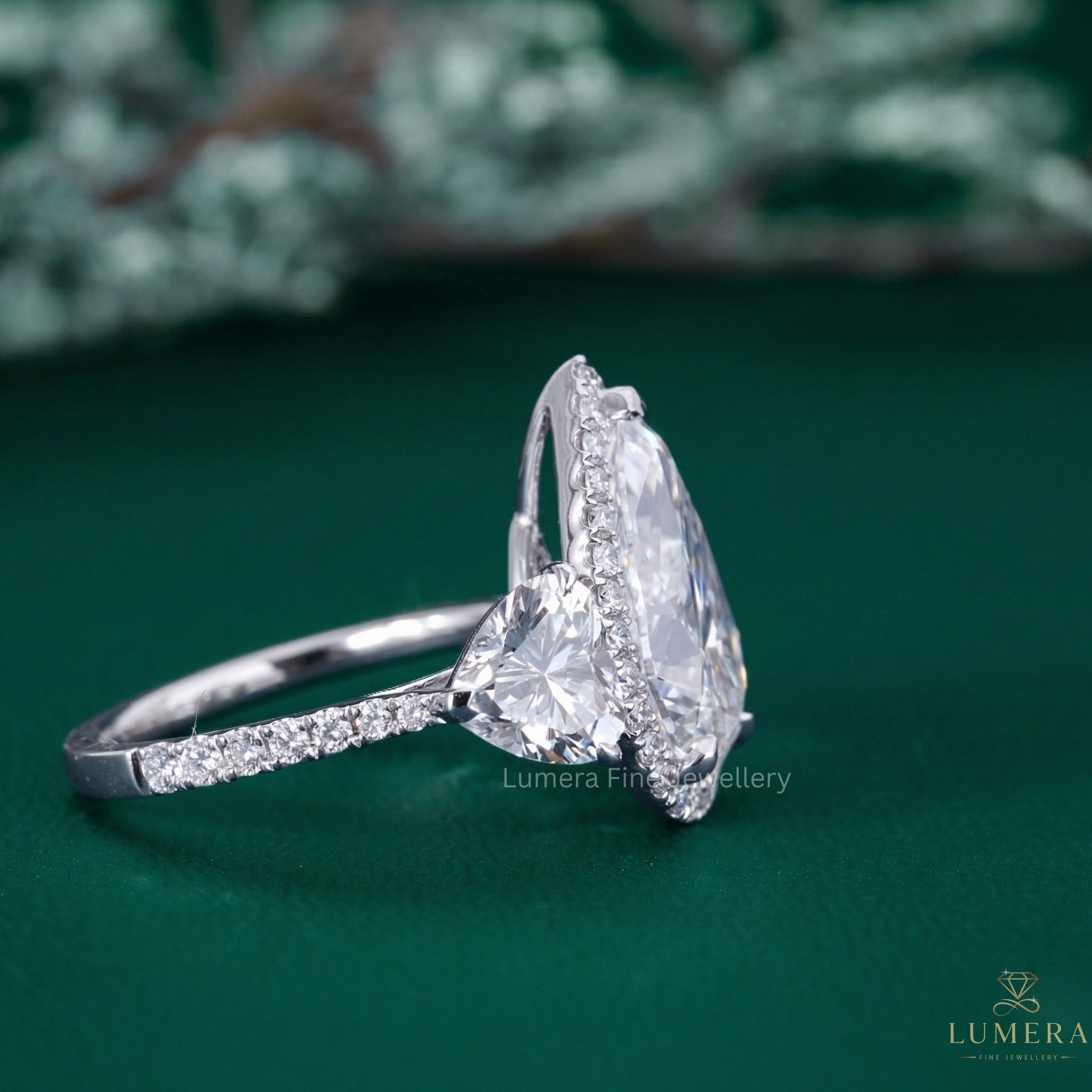 pear shape engagement ring with teardrop engagement ring.
