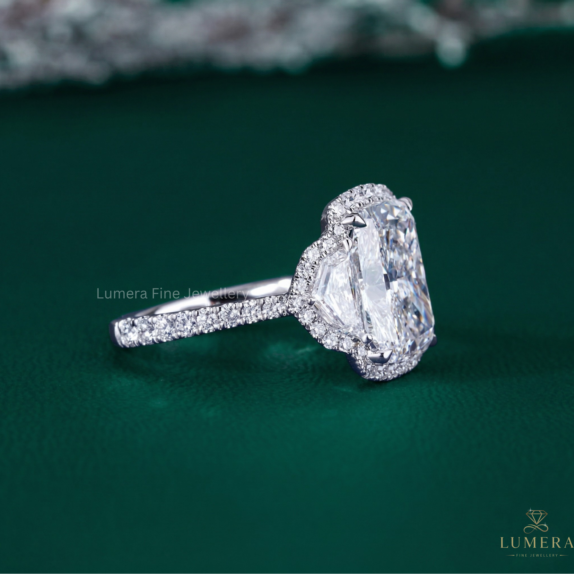 halo engagement ring with cathedral setting ring.