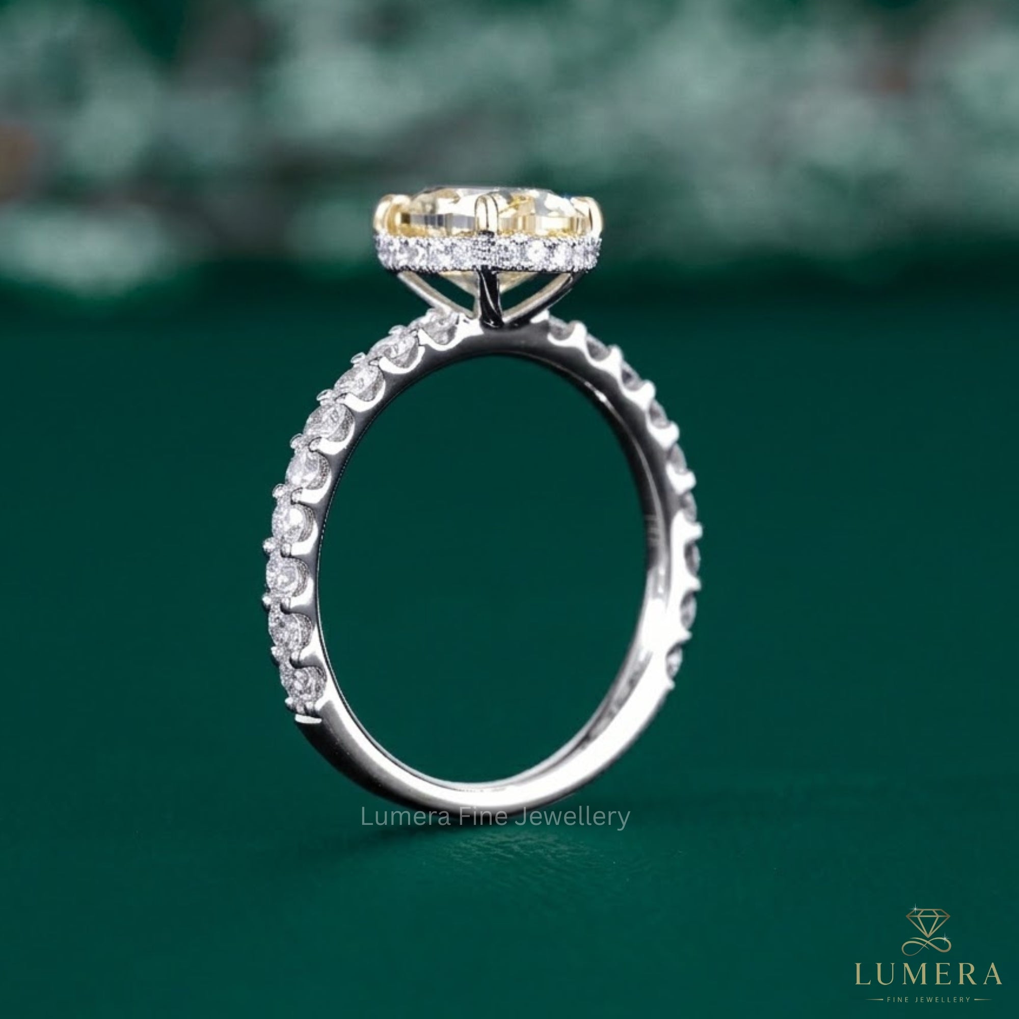 yellow oval diamond ring with hidden halo engagement ring.