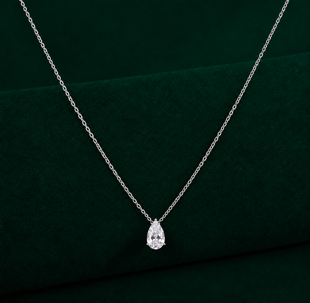 solitaire diamond pendant with almond gold pendant.
