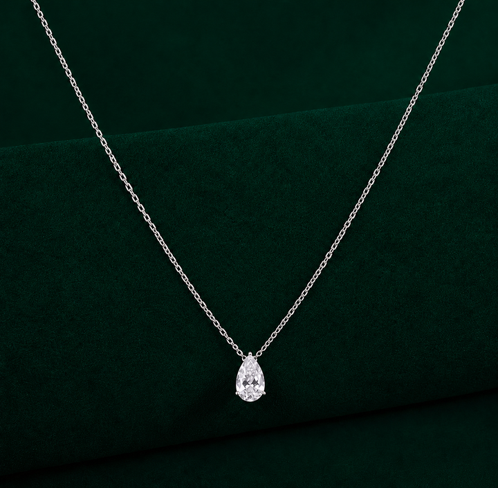 solitaire diamond pendant with almond gold pendant.

