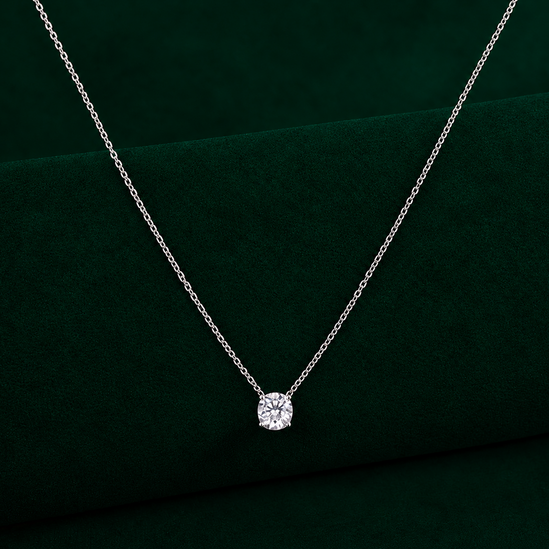 round solitaire diamond pendant with solid gold pendant.
