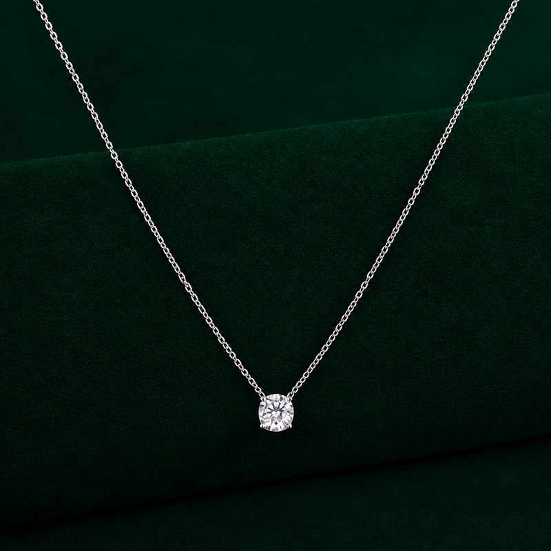 round solitaire diamond pendant with solid gold pendant.
