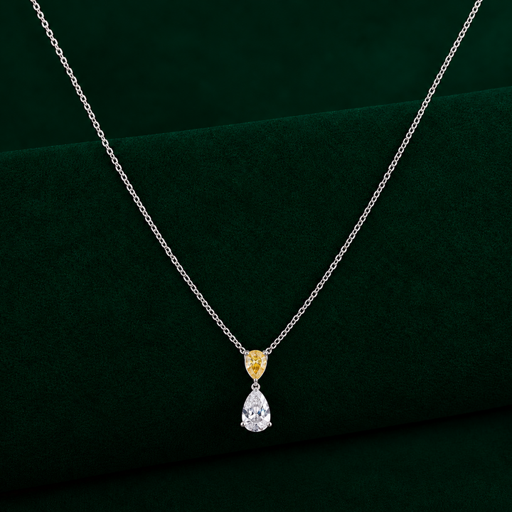 two stone chain pendant with teardrop diamond dangle necklace.
