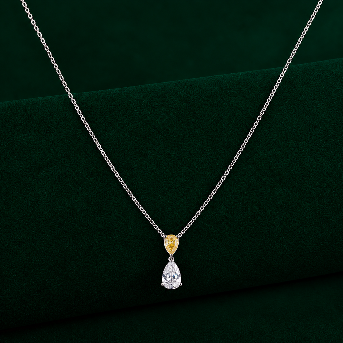 yellow and white diamond with two stone chain pendant.

