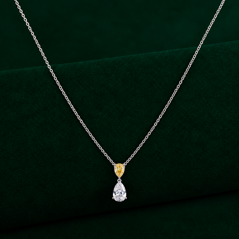 yellow and white diamond with two stone chain pendant.
