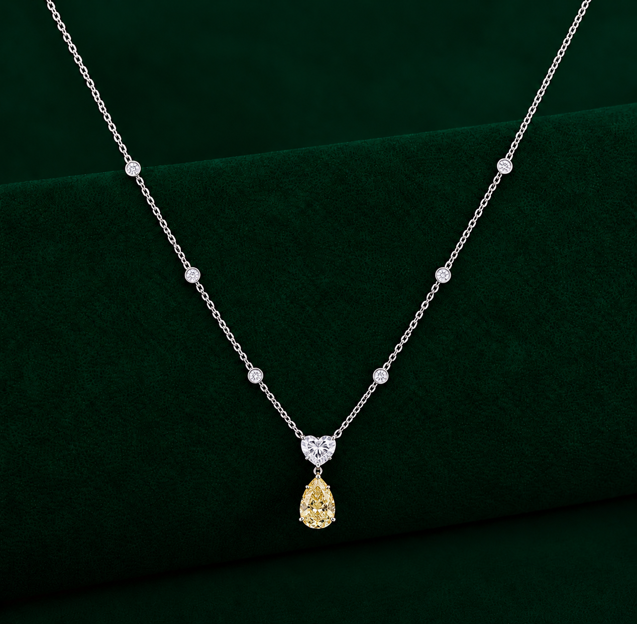 pear heart pendant with teardrop dangle pendant.
