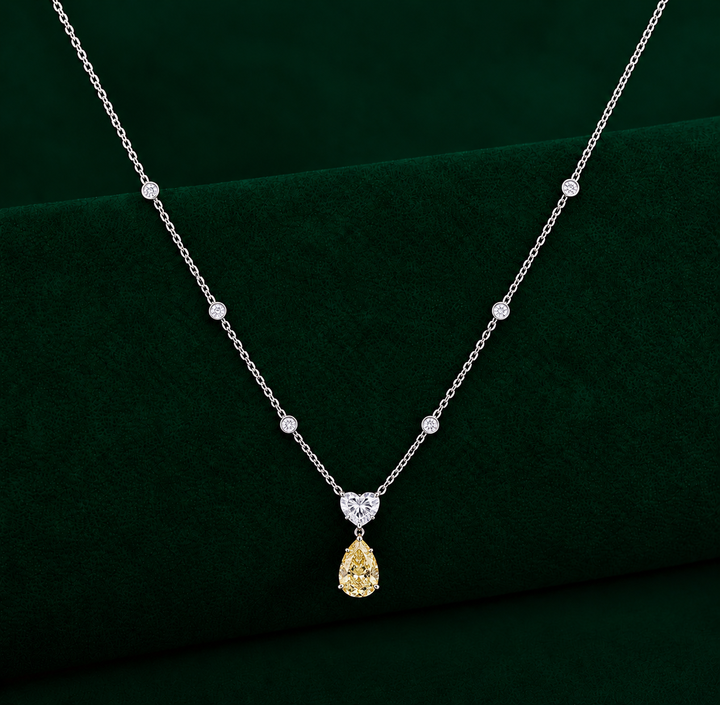pear heart pendant with teardrop dangle pendant.
