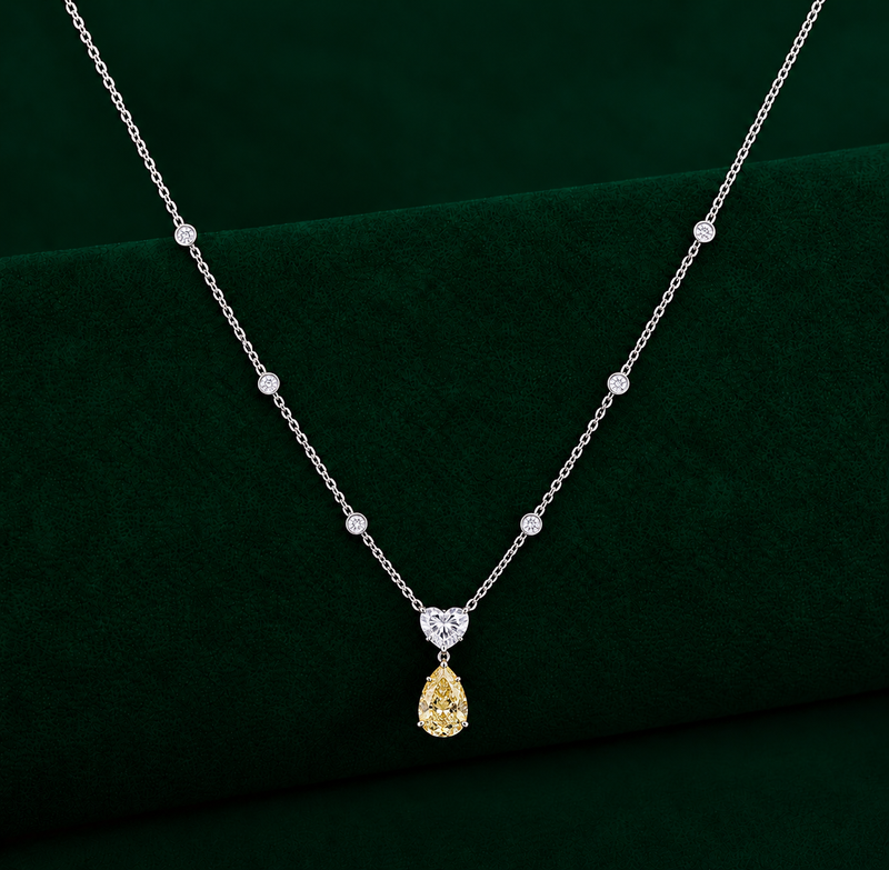 pear heart pendant with teardrop dangle pendant.
