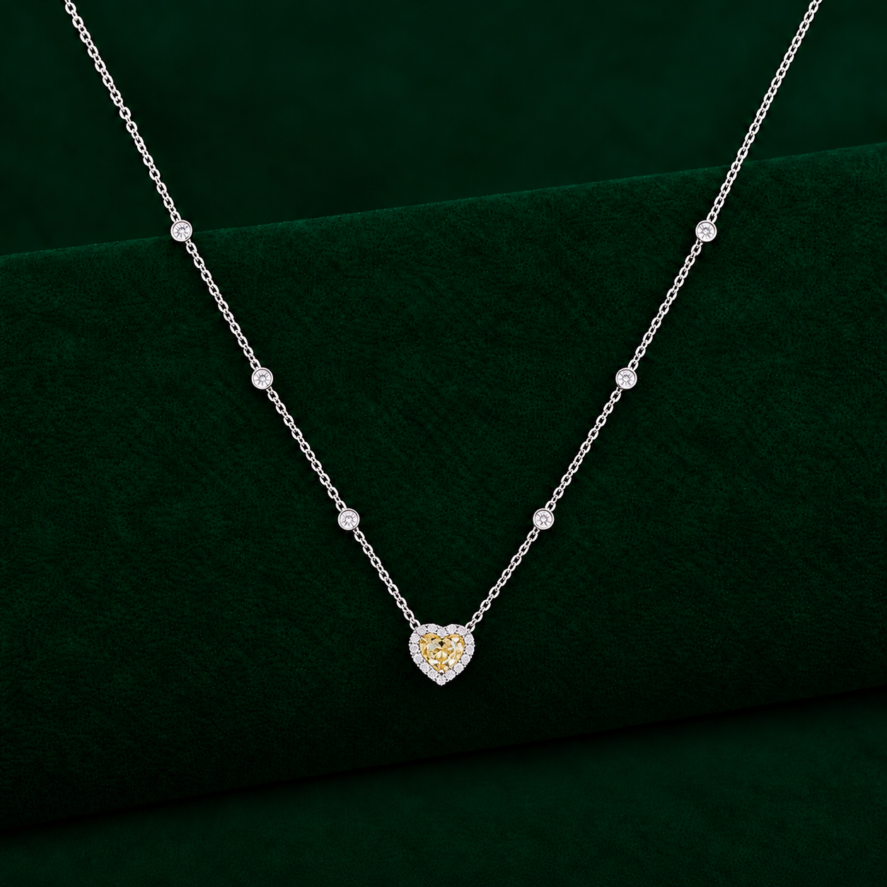 yellow diamond heart pendant with halo diamond pendant.
