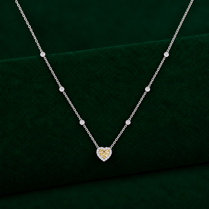 yellow diamond heart pendant with halo diamond pendant.
