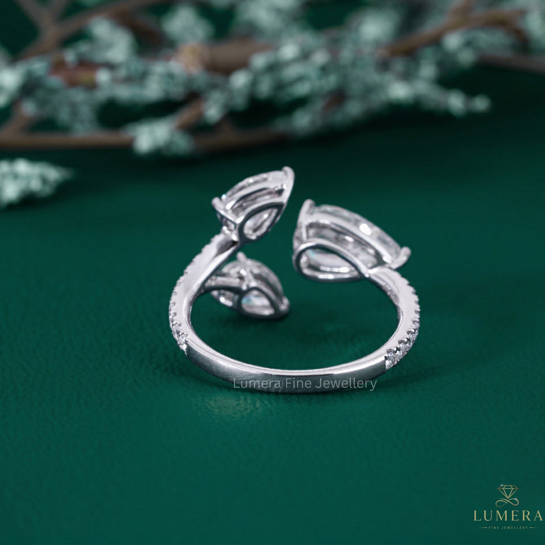 nature inspired engagement ring with nature inspired ring.