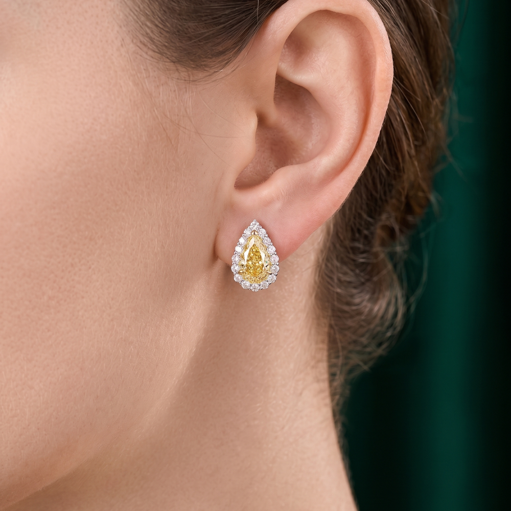 yellow pear earrings with pear stud earrings.
