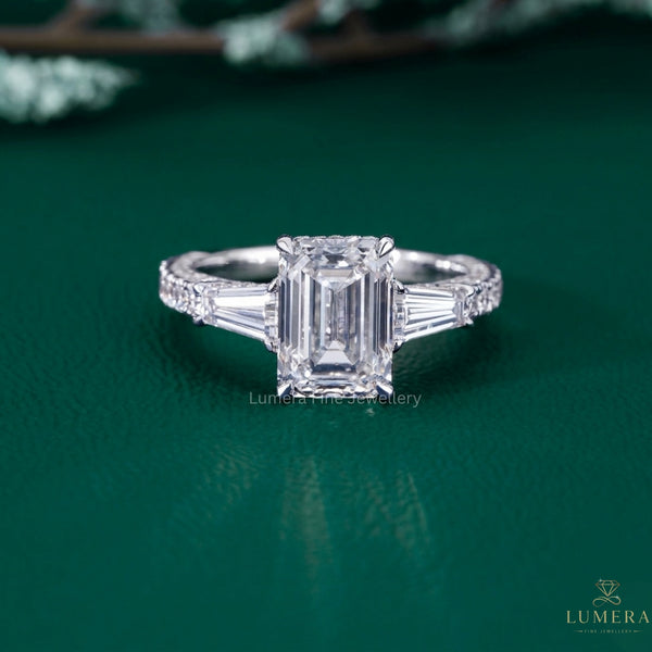 emerald shape engagement ring with hidden halo diamond ring.