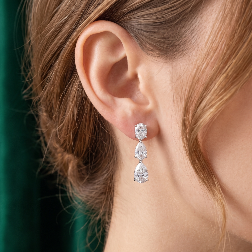 push back earrings with claw prong set.
