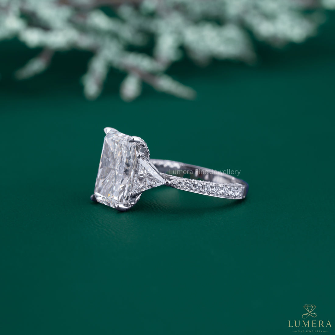Pave diamond ring with three row pave setting.