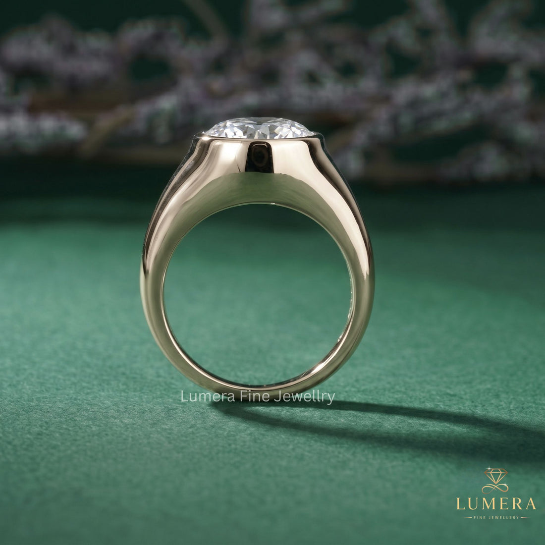 round diamond solitaire ring with tapered shank setting.
