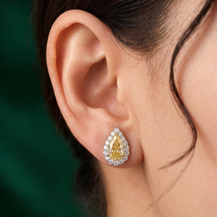 Yellow Pear Diamond Halo Earrings In Solid Gold