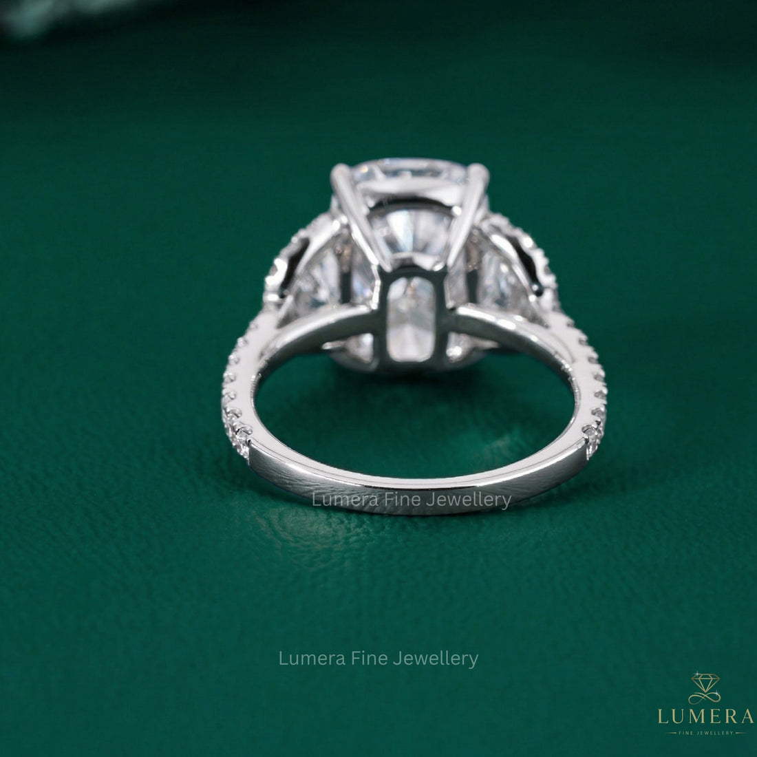 half moon stones with side stone halo ring.