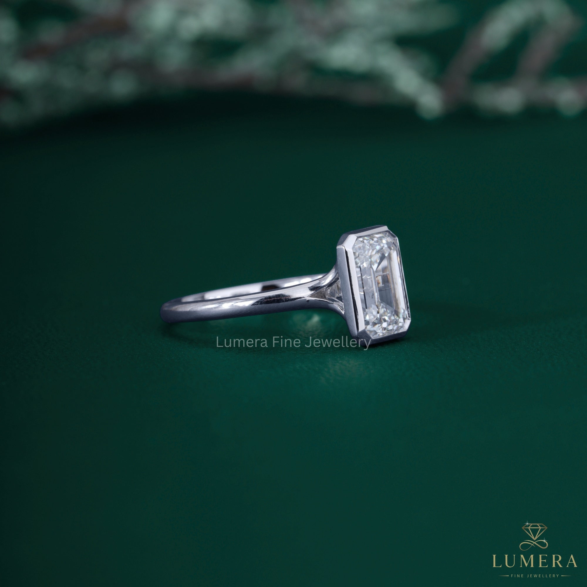 Open bezel setting ring with engagement ring.