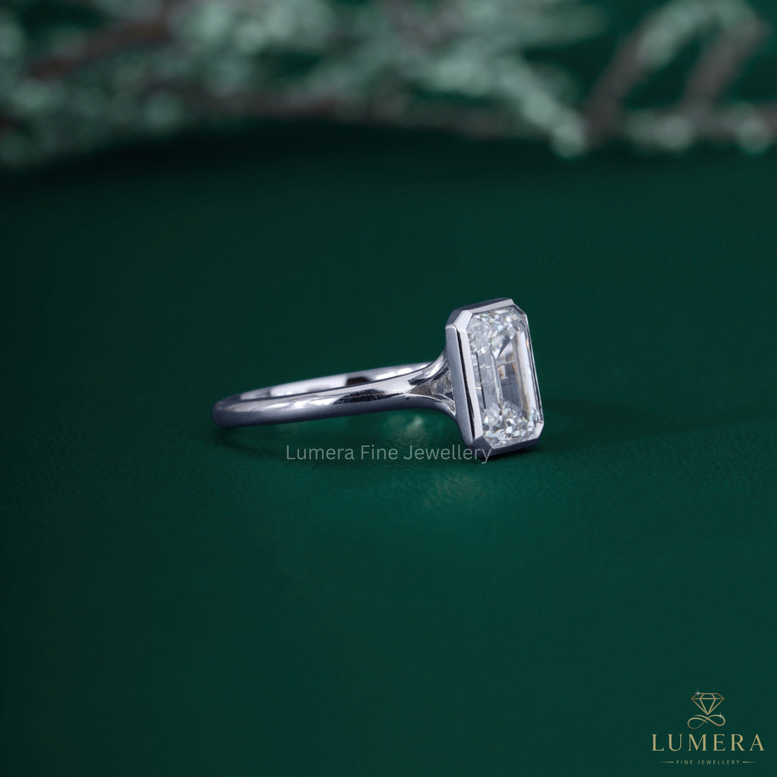 Open bezel setting ring with engagement ring.