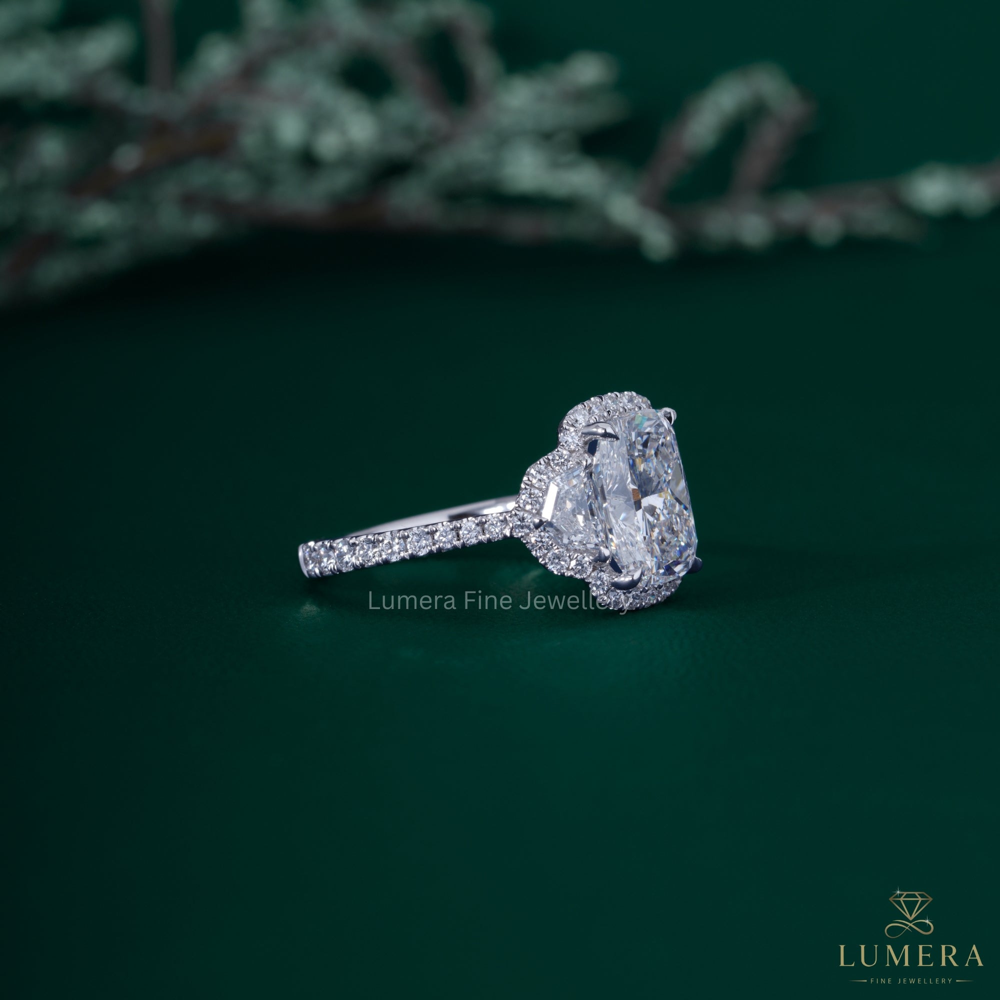 Three stone halo ring with Pave setting ring.