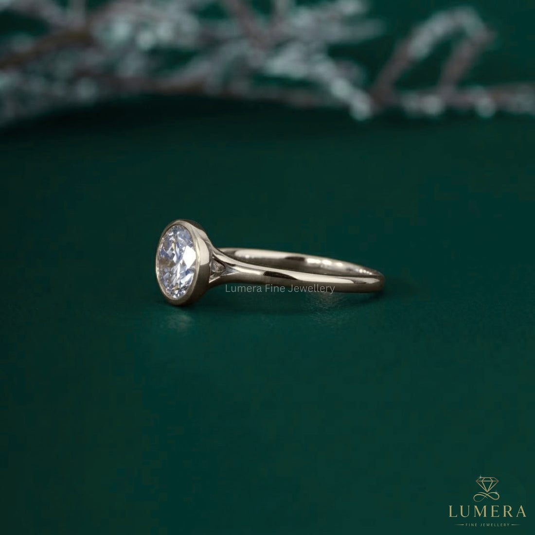 Bezel mount ring with cathedral setting ring.