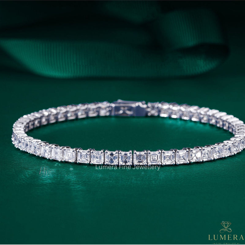 asscher cut diamond with square cut eternity bracelet.
