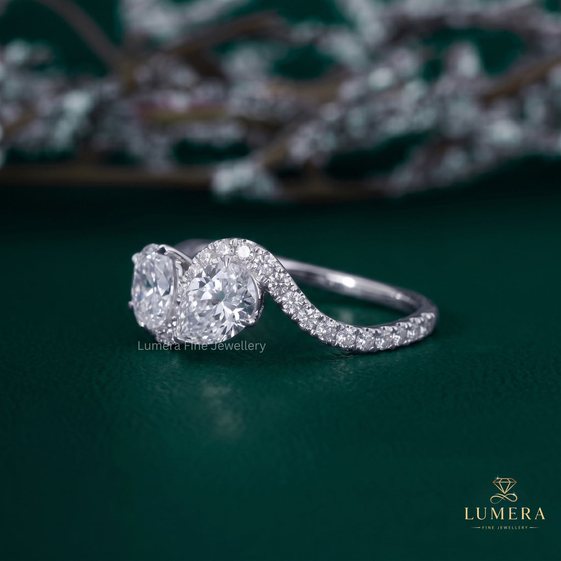 Pear diamond engagement ring with Pear shaped diamond ring.
