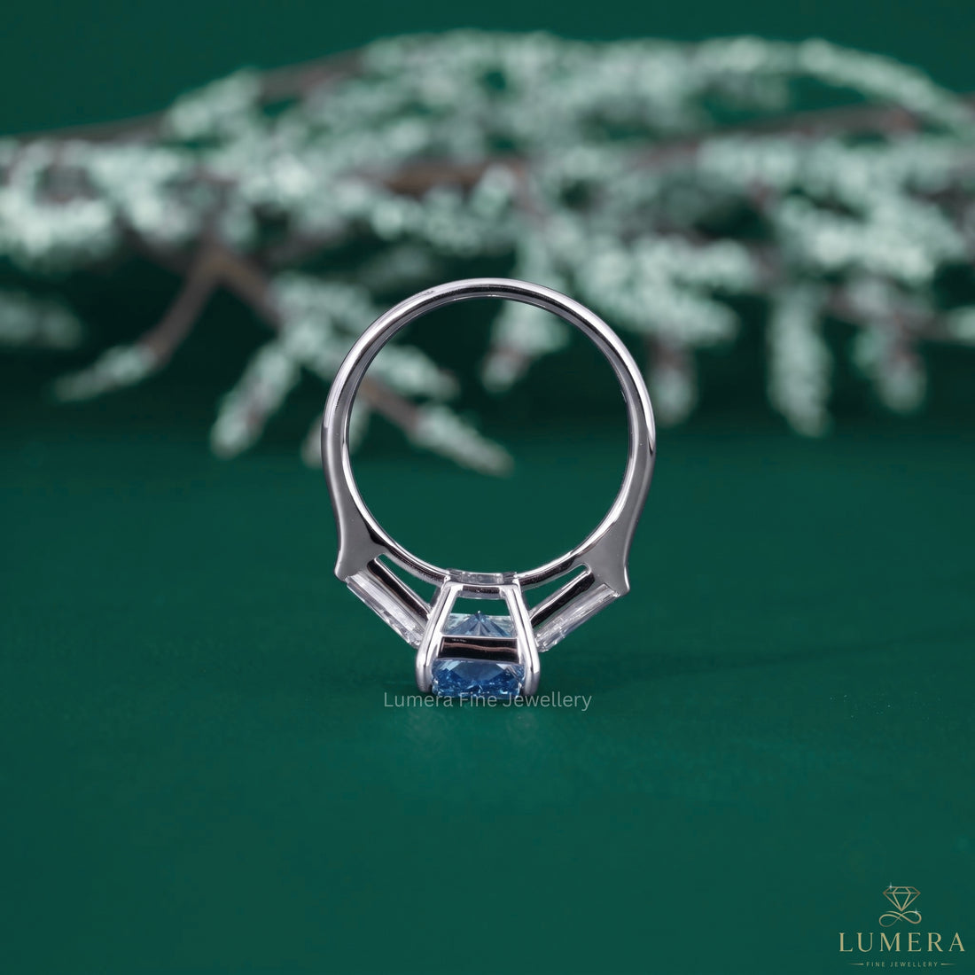 Tapered baguette side stone with tapered baguette diamond.