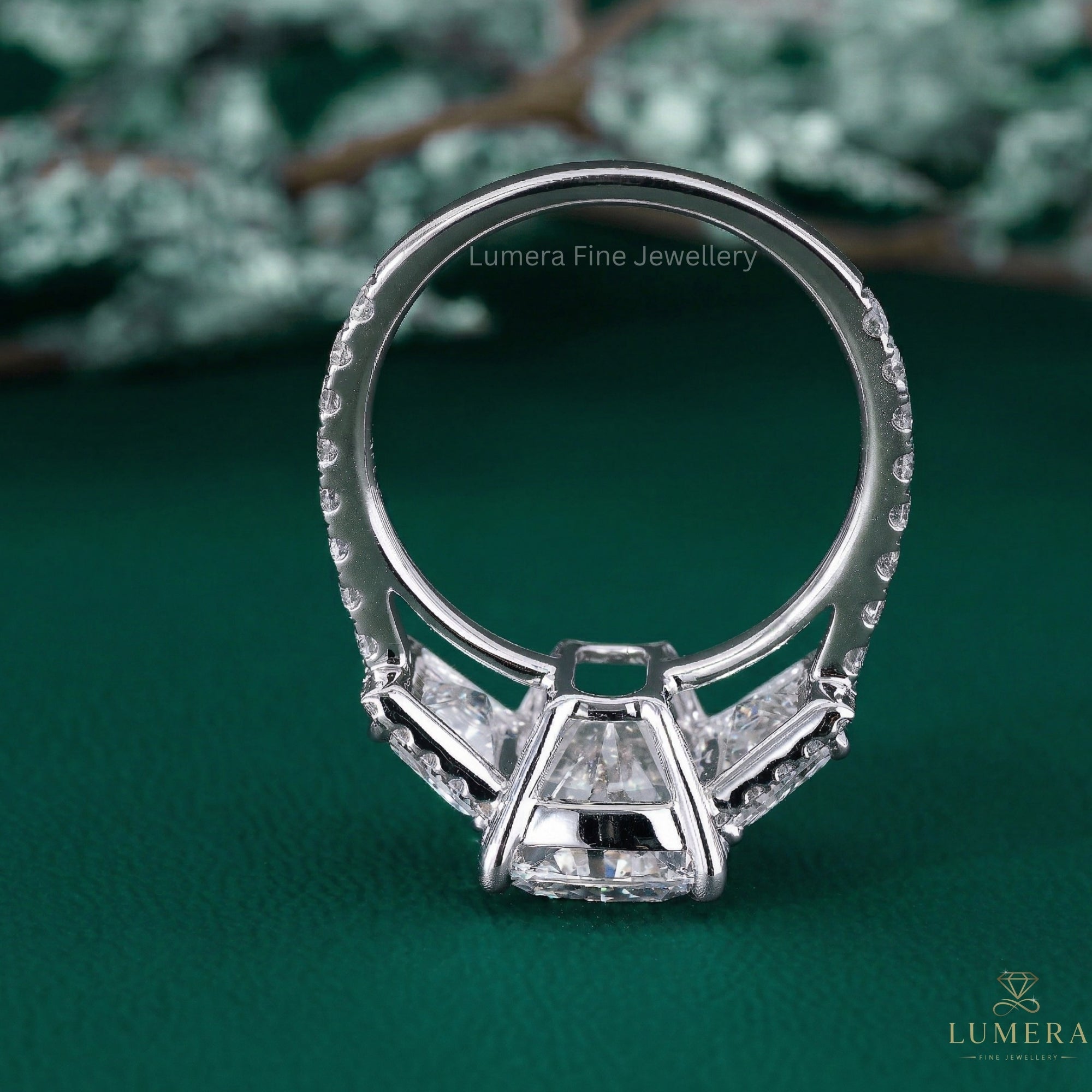 three stone diamond engagement ring with past present future ring.
