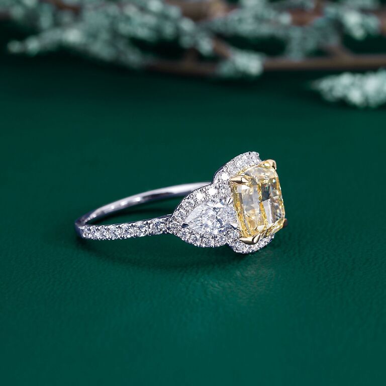 two tone gold ring with 3 stone diamond ring.
